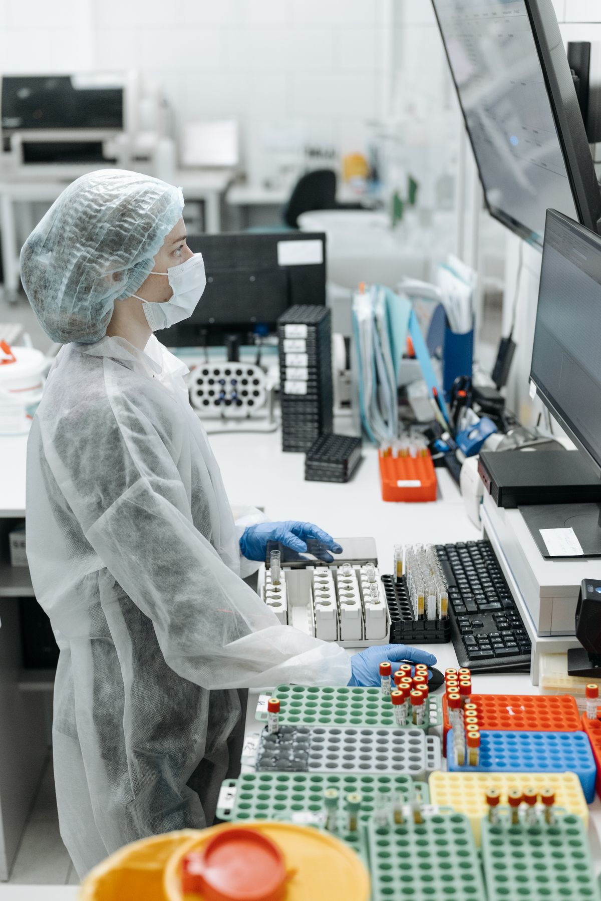 Scientist analyzing samples at a laboratory workstation